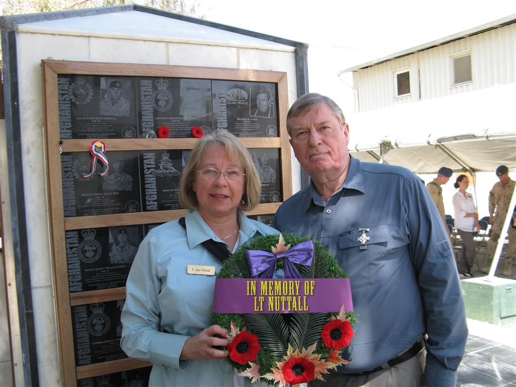 Jane and Rick laying a wreath for Andrew.